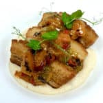 Crispy Pork Belly, Smoked Cheddar Farina, Apricot Chutney and Pea Shoots