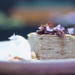 Mil Crepa - Almond flour tortillas soaked in cafe de olla, layered with Mexican chocolate pastry cream