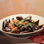 Suquet de Musclos i Pulpo mussels and saffron and tomato and potato and octopus