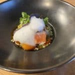 Pacific salmon palissade peaches with curry tomatoes mirin kumbu Thai basil cilantro coconut cream